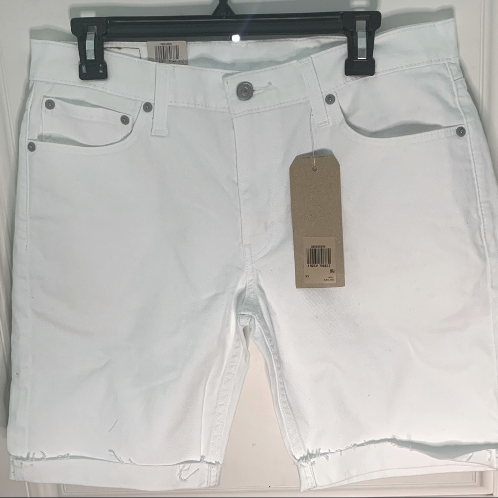 NWT Cute pair of white jean shorts these are a size 33. - Picture 2 of 4